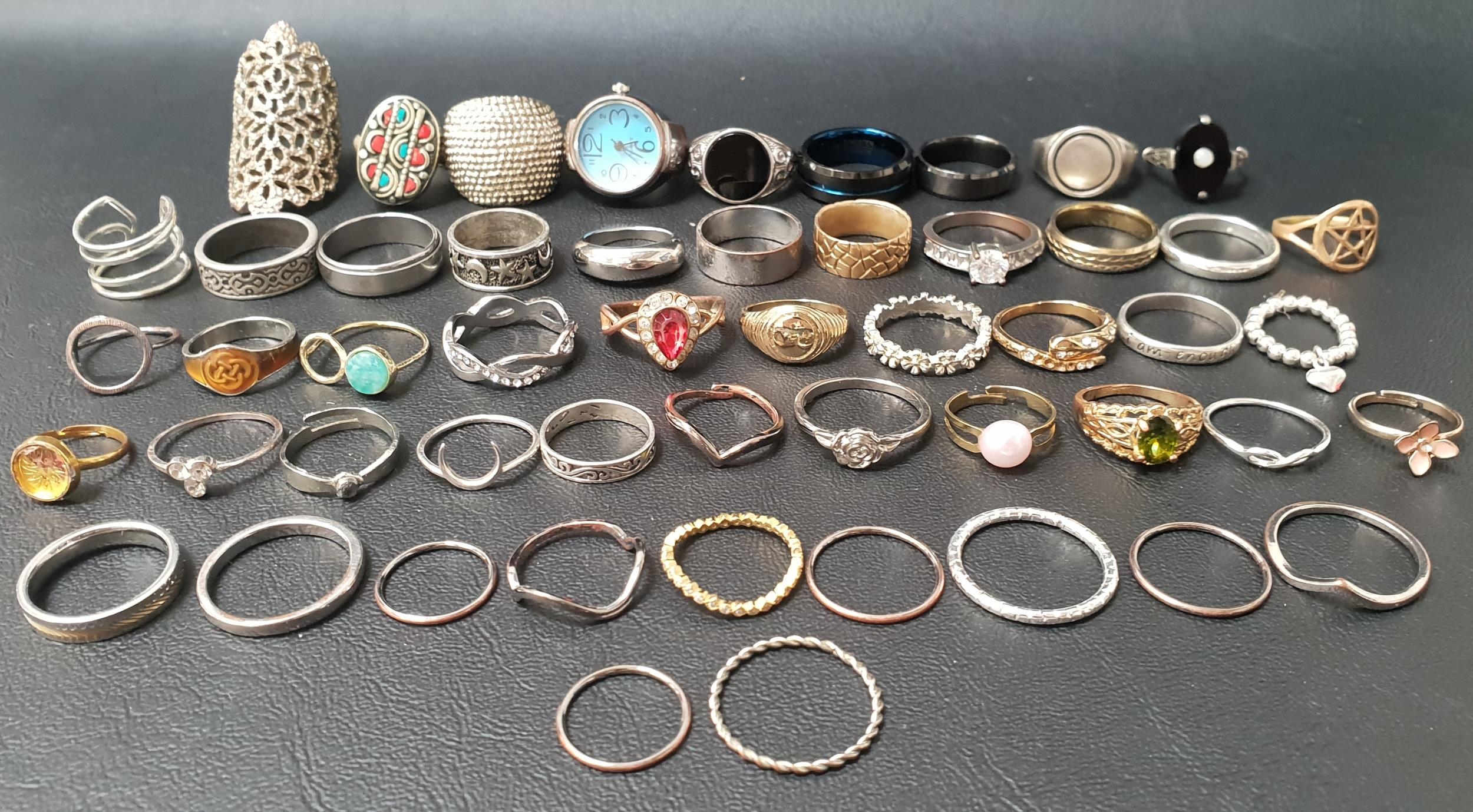 SELECTION OF SILVER AND OTHER RINGS of various sizes and designs including enamel and stone set