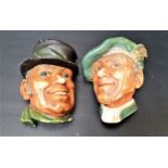 TWO BOSSONS PLASTER PLAQUES depicting a Scotsmen wearing a bonnet, 14cm high and a gentleman wearing