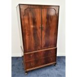 BEITHCRAFT MAHOGANY COMPACTUM with a pair of panelled doors opening to reveal a shelved interior