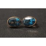 PAIR OF BLUE TOPAZ STUD EARRINGS the oval cut topaz on each approximately 0.75cts, in nine carat