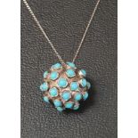 TURQUOISE SET SILVER PENDANT the ball pendant set with round cabochon turquoise stones overall, on