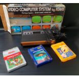 ATARI COMPUTER GAMES SYSTEM with power lead, joystick and three classic games - Space Invaders,