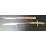 FRENCH SABRE BAYONET with a 57.5cm long shaped blade, the ribbed handle slot marked 79, with a