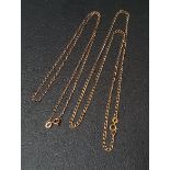 TWO NINE CARAT GOLD CURB LINK NECK CHAINS 43cm and 45.5cm long respectively, total weight