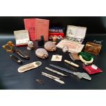 MIXED LOT OF COLLECTABLES contained in a small case including a decorative measuring tape,