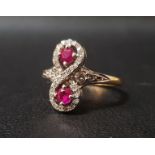 UNUSUAL RUBY AND DIAMOND RING the round cut rubies totalling approximately 0.35cts, within multi