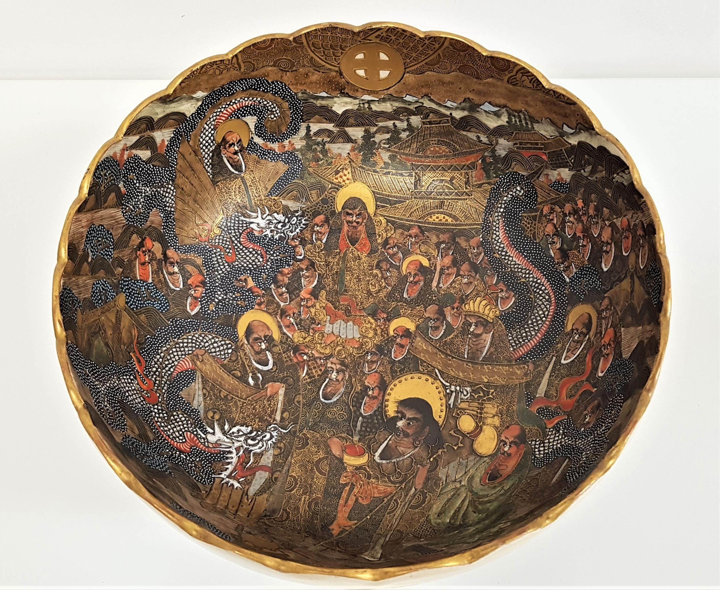 JAPANESE SATSUMA BOWL with a scalloped gilt edge rim, the bowl decorated with two dragons and many - Image 2 of 2