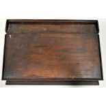 OAK CLERKS TOP DESK with a three quarter gallery top above a sloping fall flap, 49.5cm wide