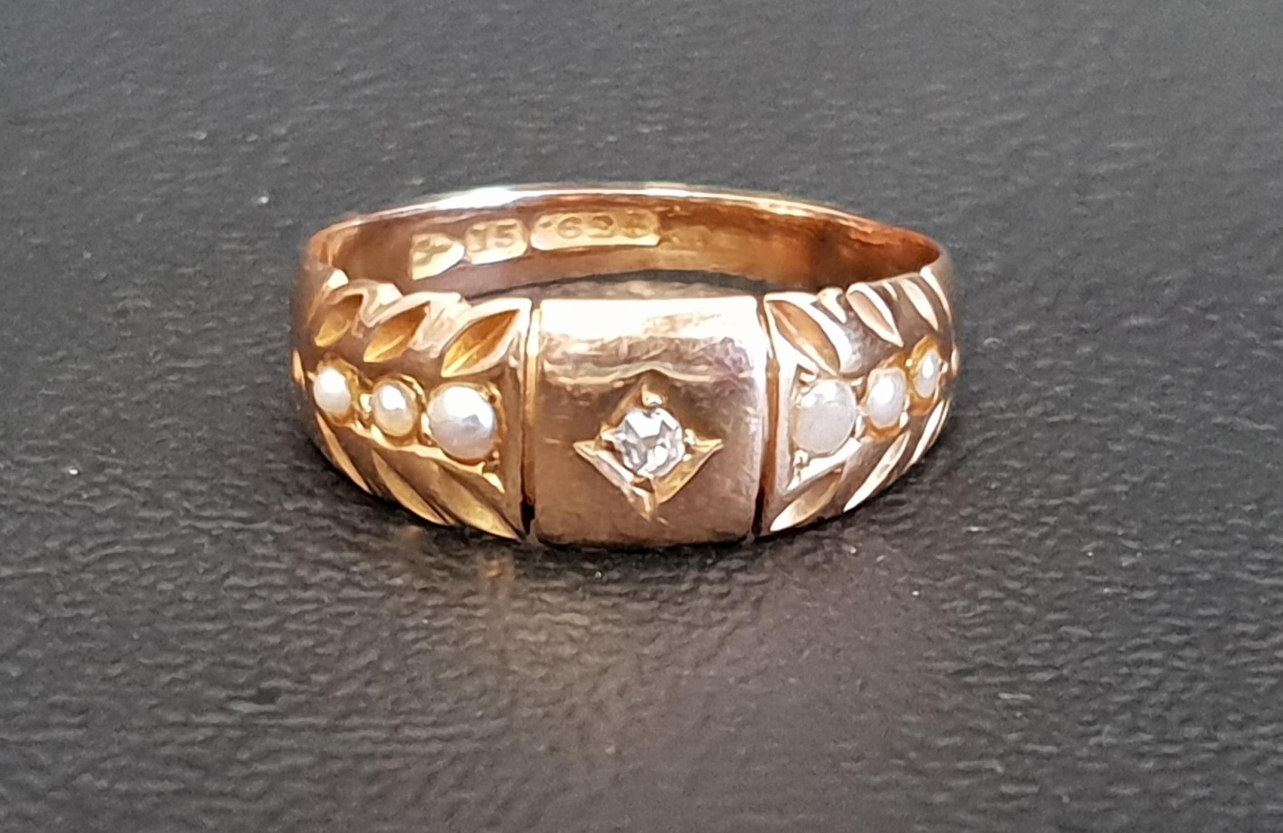 EDWARDIAN DIAMOND AND SEED PEARL RING in fifteen carat gold, ring size N and approximately 2.5 grams