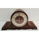 WALNUT CASED MANTLE CLOCK the circular silvered dial with Arabic numerals and an eight day