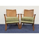 PAIR OF STRONGBOW FURNITURE WALNUT ELBOW CHAIRS with caned backs and shaped arms above loose cushion