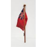 BRITISH MARITIME RED ENSIGN on a mahogany pole, 81cm high