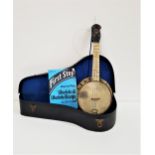 BROADCASTER UKELELE with a mahogany neck with mottled plastic overlay, in a fitted case with