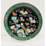 JAPANESE FAMILLE NOIR CHARGER with a green floral border and centred with a pheasant, with character
