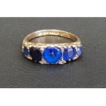 BLUE GLASS SET RING on eighteen carat gold shank, ring size M-N and approximately 3.4 grams