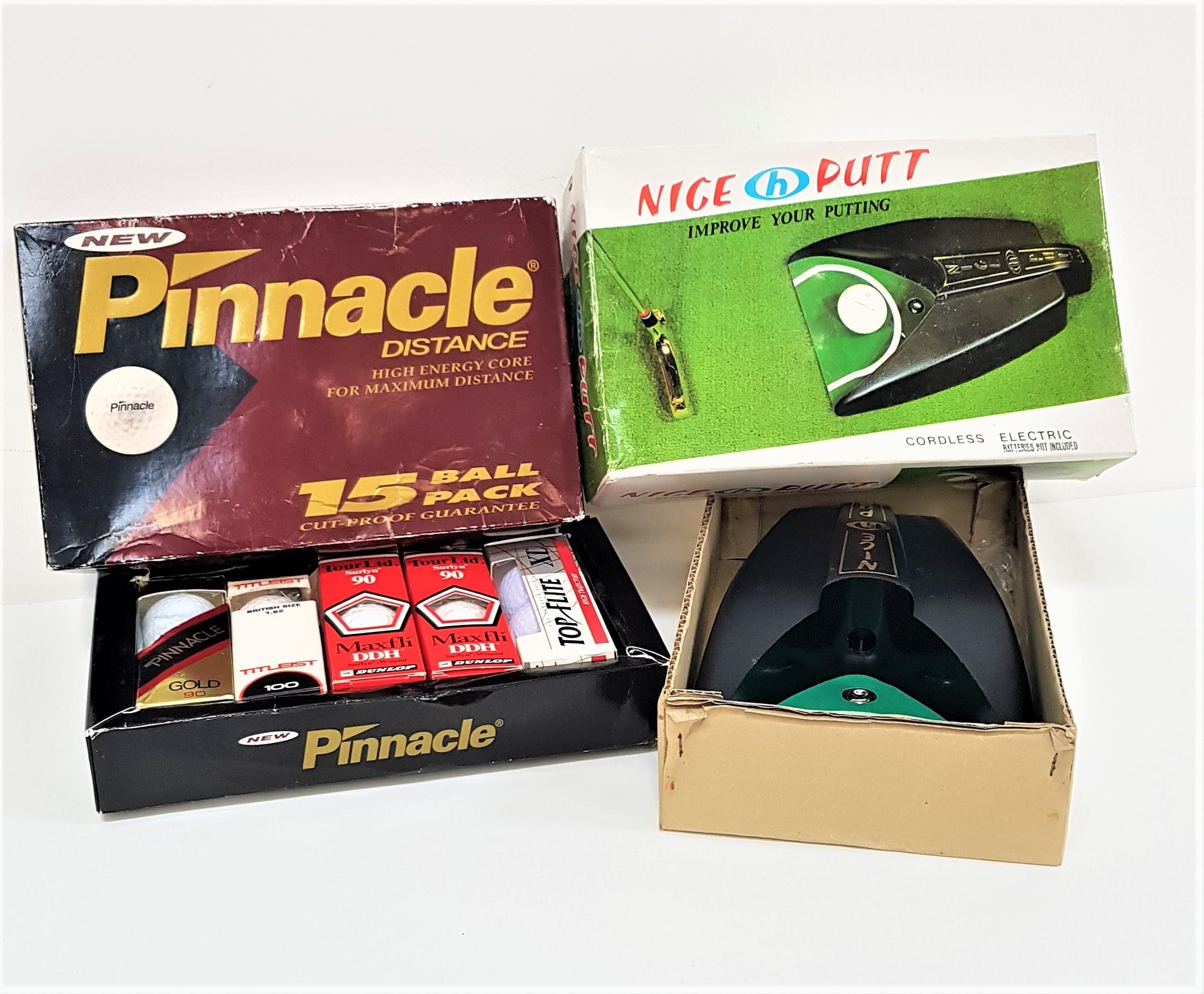 GOLFING INTREST an electronic putting trainer, Nice Putt, boxed, together with a boxed set of