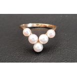 PEARL SET WISHBONE RING on eighteen carat gold shank, ring size P