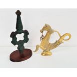 VENETIAN GONDOLA BRASS OAR LOCK in the form of a sea horse, 19.5cm high; together with a glasgow