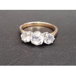 GRADUATED CZ THREE STONE RING on nine carat gold shank, ring size O and approximately 3.3 grams