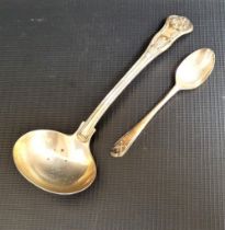 VICTORIAN SILVER LADLE London hallmarked for 1859; together with a Walker and Hall silver golfing