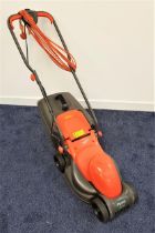 FLYMO EASIMO ELECTRIC LAWNMOWER with a grass collection rear basket and a 32cm cut