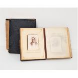 TWO VICTORIAN AND LATER LEATHER BOUND PHOTOGRAPH ALBUMS with pictures of families, children and pets