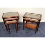 MAHOGANY NEST OF TABLES with shaped carved tops with inset glass, standing on cabriole supports,