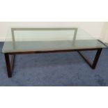 LARGE OCCASIONAL TABLE with a rectangular glass top on a stained oak flowing frame, 160cm wide