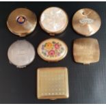 SELECTION OF COMPACTS including a silver example with engine turned decoration, and others with