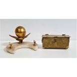 DECORATIVE DESK INKWELL the glass inkwell within a gilt metal ball raised upon a gilt metal eagle