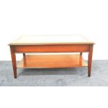 MAHOGANY OCCASIONAL TABLE with an inset glass top, standing on tapering supports, 102cm wide