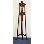 LARGE MAHOGANY EASEL with pierced and carved decoration, 215cm high