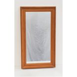 RECTANGULAR PINE WALL MIRROR with a plain plate, 39.5cm x 70cm