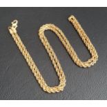 TWENTY-ONE CARAT GOLD ROPE TWIST NECK CHAIN 50cm long and approximately 4.5 grams