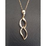 DIAMOND SET NINE CARAT GOLD PENDANT the two section pendant on nine carat gold chain, total weight