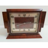 WALNUT CASED MANTLE CLOCK the rectangular silvered dial with Arabic numerals and an eight day