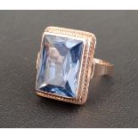 BLUE TOPAZ SINGLE STONE RING the rectangular blue topaz measuring approximately 15mm x 11.5mm x 6.