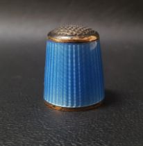 NORWEGIAN SILVER AND BLUE ENAMEL THIMBLE by Aksel Holmsen, with gilt rims and interior