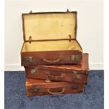 THREE VINTAGE LEATHER SUITCASES all with reinforced corners and leather handles, 65.5cm and 62cm