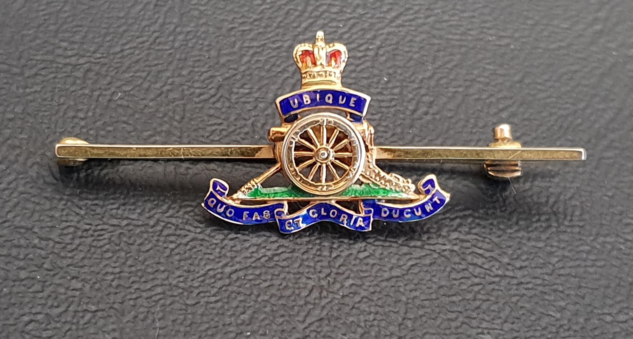 ENAMEL DECORATED NINE CARAT GOLD ROYAL ARTILLERY SWEETHEART BROOCH by Garrard & Co., in original