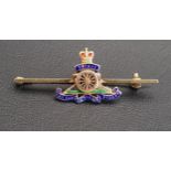 ENAMEL DECORATED NINE CARAT GOLD ROYAL ARTILLERY SWEETHEART BROOCH by Garrard & Co., in original