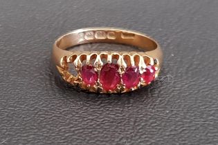 GRADUATED RED GEM STONE RING on eighteen carat gold shank, ring size L and approximately 2.8