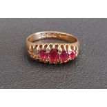 GRADUATED RED GEM STONE RING on eighteen carat gold shank, ring size L and approximately 2.8