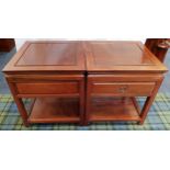 PAIR OF CHINESE TEAK SIDE TABLES each with a panelled top above a frieze panelled drawer with a