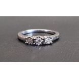 ILLUSION SET DIAMOND THREE STONE RING the diamonds totalling approximately 0.15cts, on eighteen