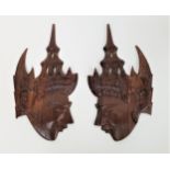 TWO BALINESE CARVED HEADS in profile and in rosewood, 27cm high (2)