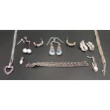 SELECTION OF SILVER JEWELLERY including a pair of aquamarine set drop earrings with entwined detail;