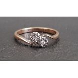 ILLUSION SET TWO STONE DIAMOND RING in twist setting, on nine carat gold shank, ring size N-O and
