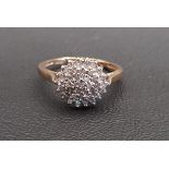DIAMOND CLUSTER DRESS RING the diamond totaling approximately 0.37cts, on nine carat gold shank,