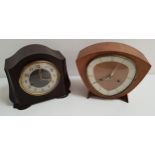 SMITHS WALNUT CASED SHAPED MANTLE CLOCK the irregular shaped dial with baton markers and an eight